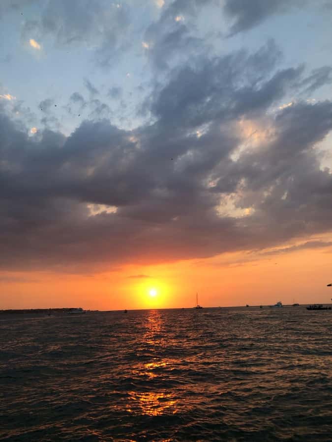 Cartagena: Sunset in boat in the bay with music and liquor - Music Level and Social Vibe: Fun, Loud, and Sometimes Crowded