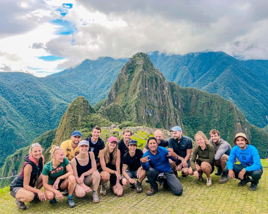 Cusco: 4-Day Lares Trek to Machu Picchu with Panoramic Train - Day 1: Calca market, ancient ruins, Lares hot springs, and alpaca valleys