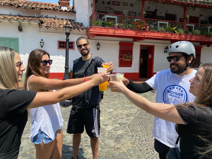 E-Bike City Tour Medellin with Local beer and Snacks - Conquistadores: a short stop that adds real neighborhood context