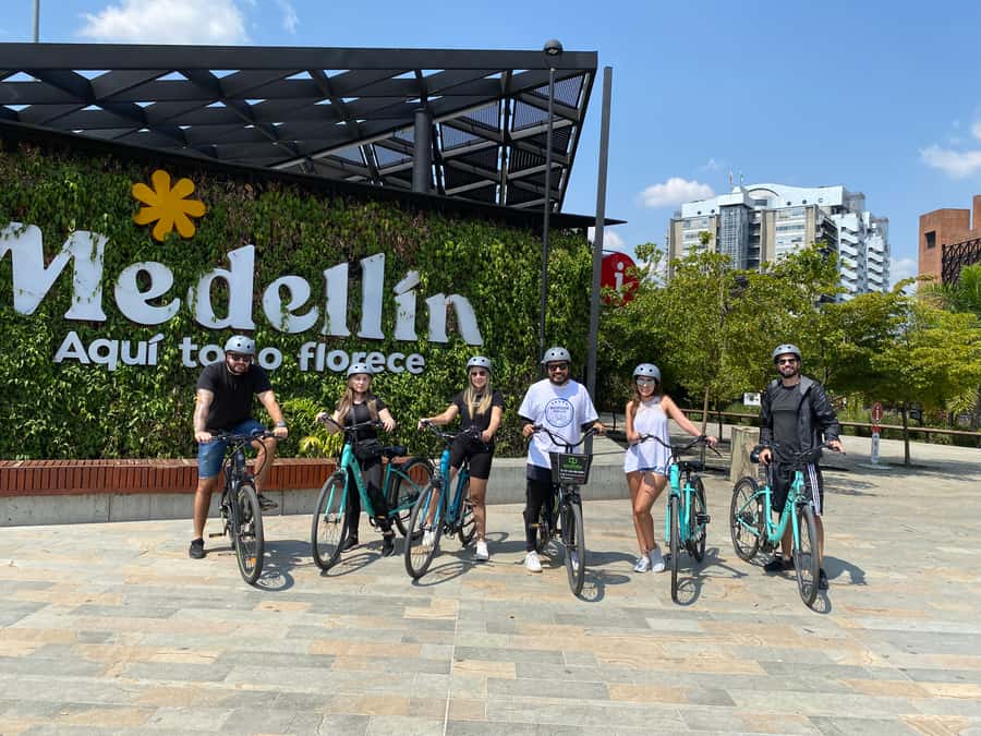 E-Bike City Tour Medellin with Local beer and Snacks - Meeting at San Joaquín Church and getting set up fast