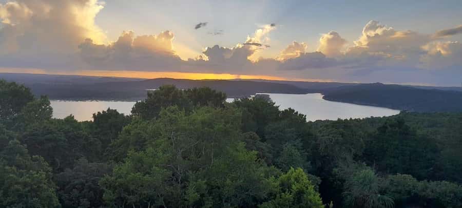 Flores: Yaxha Shared Sunset Tour with Transportation & Guide - Price and Value: $25 Plus Park Fees