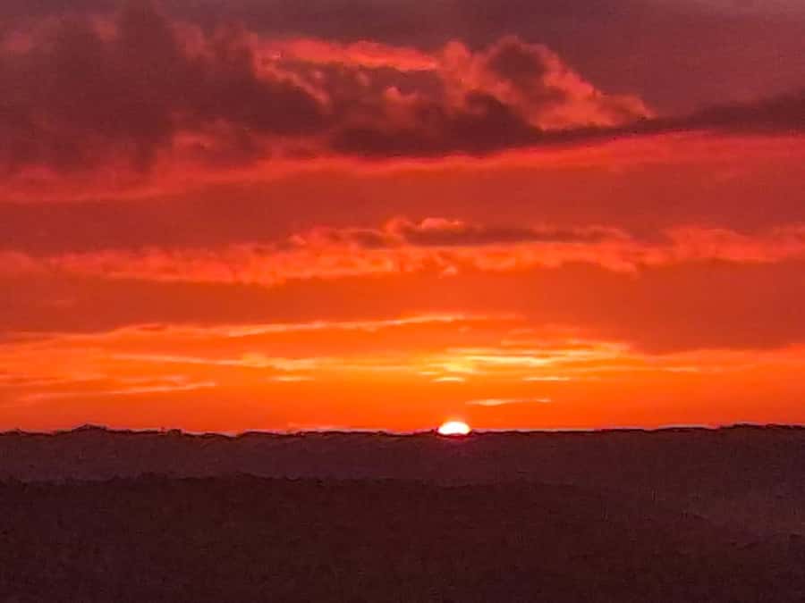 Flores: Yaxha Shared Sunset Tour with Transportation & Guide - Sunset at Structure 216: Temple of the Red Hands View