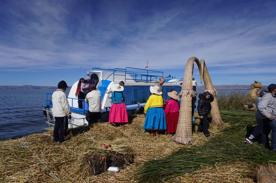 From Cusco: Lake Titicaca, Uros and Amantani by sleeper bus - Uros Floating Islands: totora building, guided visiting, and optional reed-raft rides