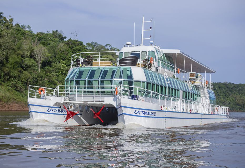 From Foz do Iguaçu: Sunset Catamaran Tour with Meal - Three Frontier Landmark and Friendship Bridge: Passing the big symbols