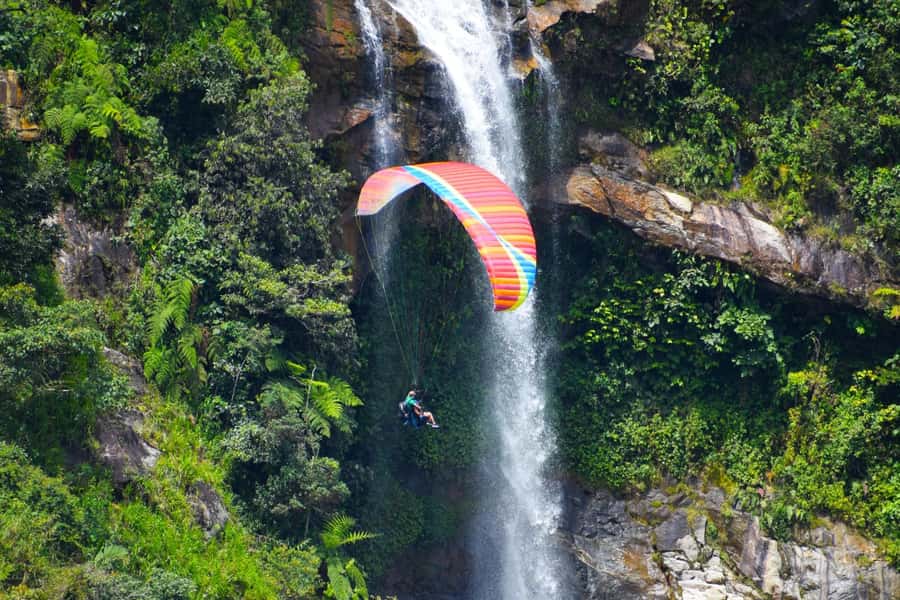 From Medellín: Paragliding Flight and Guatape Tour - Guatapé walking tour: colorful streets and local stories