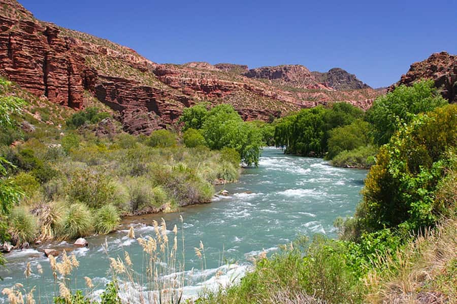 From Mendoza: San Rafael Sightseeing and Atuel Canyon Tour - Valle Grande Dam riverside base: views, lunch, and your optional water plan