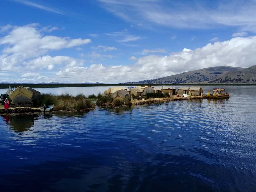 From Puno: Floating Islands of the Uros Half-Day Tour - What to bring and what can get annoying (weather and rules)